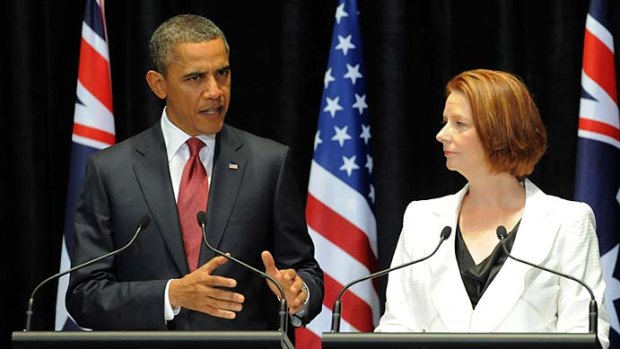 President Obama on the dias with Julia Gillard.