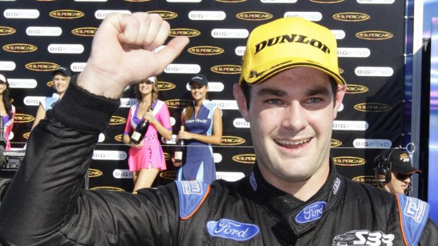 Ford flag-flyer ... Stone Brothers Racing driver Shane van Gisbergen after his V8 Supercars win at the Hidden Valley Raceway in Darwin yesterday.