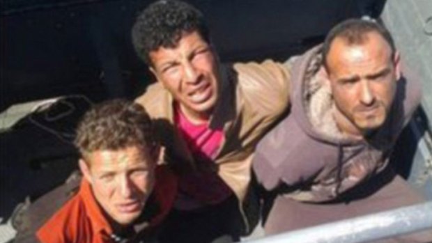 A photograph of the three arrested divers that the Egyptian military released on Facebook.