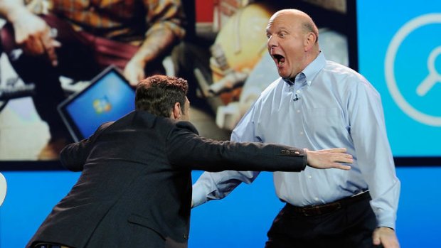 Microsoft CEO Steve Ballmer hugs host Ryan Seacres.