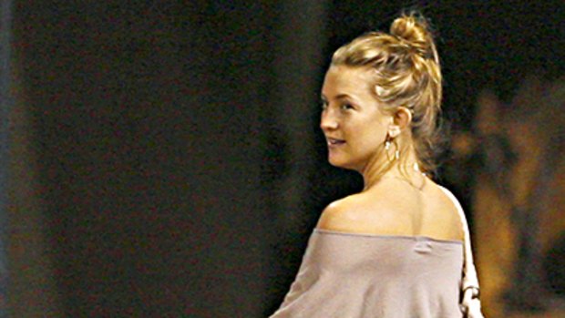 Styled for the ball game ... Kate Hudson courts the paparazzi.