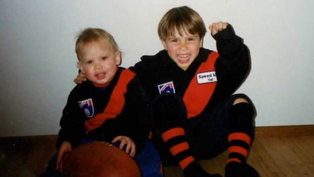 Young brothers Luke (left) and Allen Christensen in their Essendon gear.