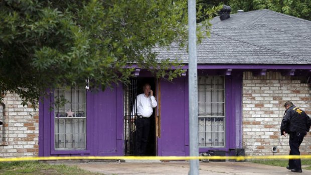 Investigation continues: The Houston house where  three men say they were held against their will.