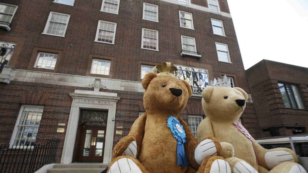 Two giant teddy bears are driven past the Lindo Wing in a PR stunt on Friday.