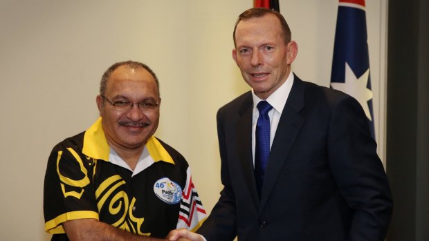 Then prime minister Tony Abbott meets PNG leader Peter O'Neill in September 2015.