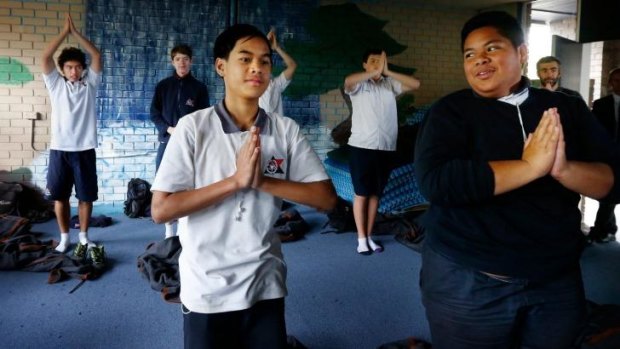 Giving peace a chance: Jerald Paul and Sione Ova, front, take part in a meditation class at Balgowlah Boys.
