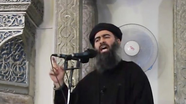 Abu Bakr al-Baghdadi delivering a sermon at a mosque in Iraq in 2014.