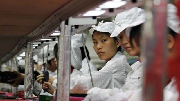 Workers at the Foxconn factory in Guangdong, China.