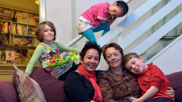 Kate Coghlan (left) and  Susan Rennie with their children Hannah, 8, Anouk, 5, (top) and Xavier, 6.