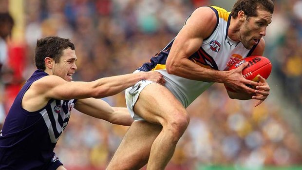 Darren Glass will lead the West Coast Eagles for at least another season.