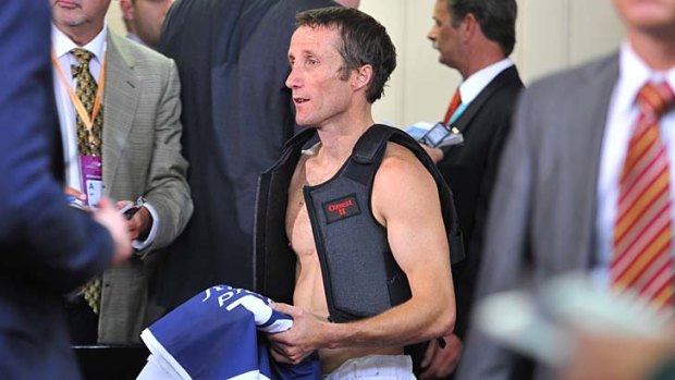 Like Seven, he's saddled wth problems: Damien Oliver after the 2012 Melbourne Cup.