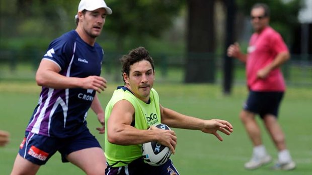 Training up a storm: Billy Slater yesterday.