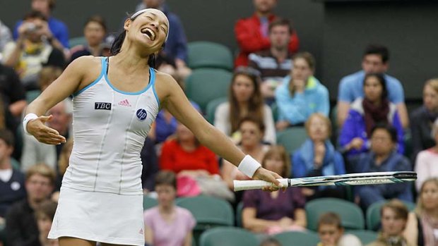 Fun and games: Kimiko Date-Krumm sees the lighter side during her clash with Venus Williams on centre court.