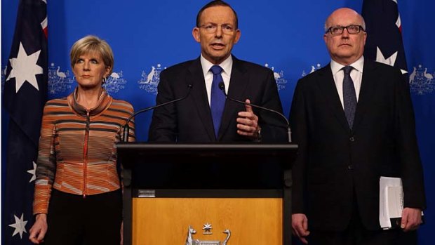 Prime Minister Tony Abbott announces the new security laws with Foreign minister Julie Bishop and Attorney-General Senator George Brandis.