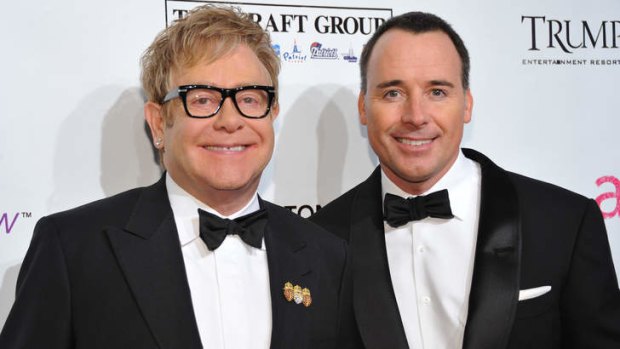 "As a high-profile couple, we feel it is our duty to do it": David Furnish with his civil partner and future husband, Elton John.