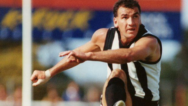 Darren Millane kicks the ball when Collingwood played Geelong at Kardinia Park March 1991.
