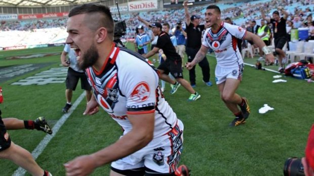 That's settled: Warriors players let off steam after beating the Broncos.