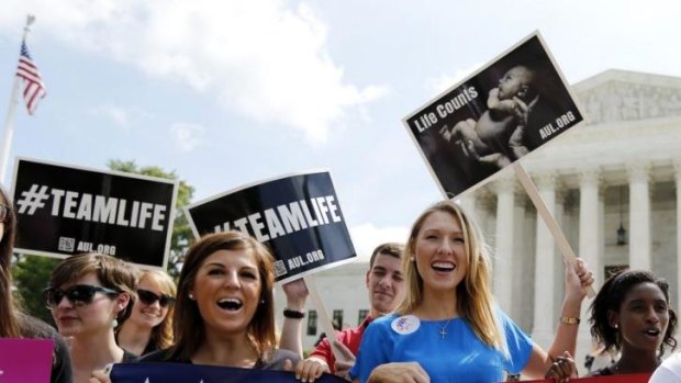 Anti-abortion protesters celebrate the US Supreme Court's ruling.