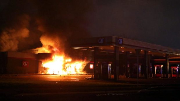 A convenience store is on fire on Sunday night in Ferguson, Missouri after protests.