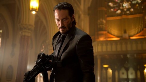 Hitman: Keanu Reeves clocks in for another gun-wielding shift in <i>John Wick</i>.