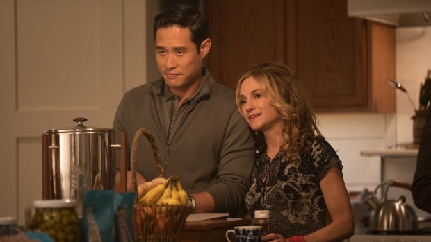 Holly Hunter as the mother and adopted son Duc (Raymond Lee) in <i>Here and Now</i>.
