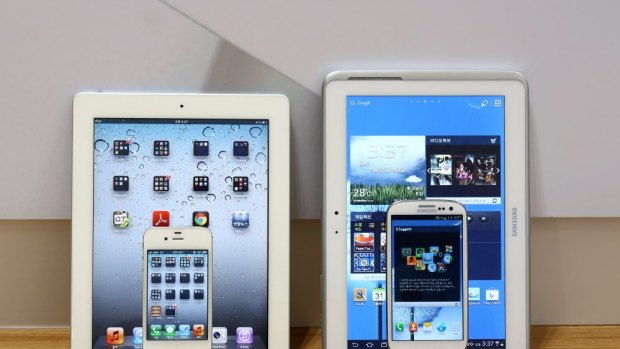 Infringement: Apple's iPad 2 and iPhone 4s, left, and Samsung's Galaxy Tab 10.1 and Galaxy S3.
