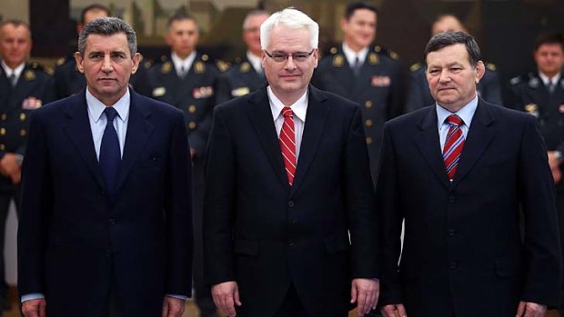 Acquitted ... former Croatian generals Ante Gotovina, left, and Mladen Markac, right, stand beside Croatian President Ivo Josipovic.
