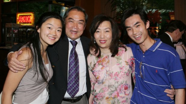 John So and his family after he was re-elected Lord Mayor of Melbourne in November 2004. Left to right: daughter Eva, John So sr, partner Wendy Cheng and son John.