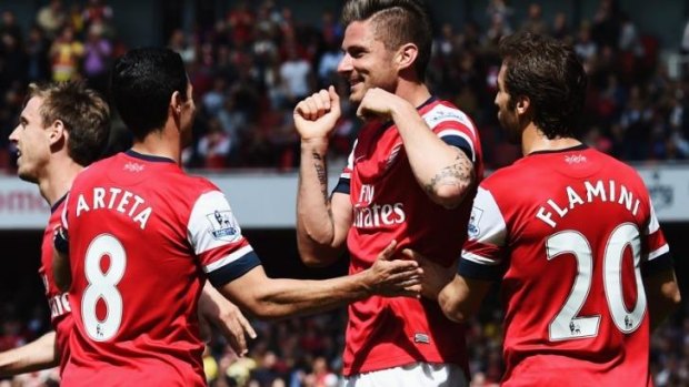 Arsenal's Olivier Giroud celebrates his goal with teammates.