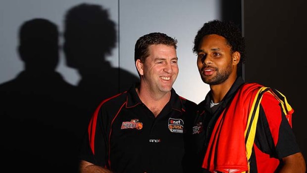 Welcome aboard: Melbourne Tigers coach Trevor Gleeson with star signing Patty Mills.