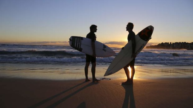 Dawn patrol: Riley Herman (right) and filmmaker Thomas Castets prepare for an early morning surf in a scene from Out in the Line-Up.