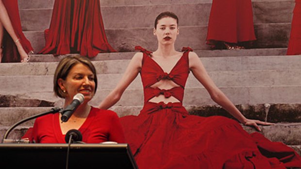 Lady in red ... Premier Anna Bligh speaks at the launch of the exhibition <i>Valentino, Retrospective: Past/Present/Future</i> at GoMA today.