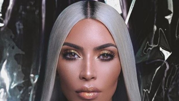 Kim Kardashian has dyed her naturally dark hair silver.
