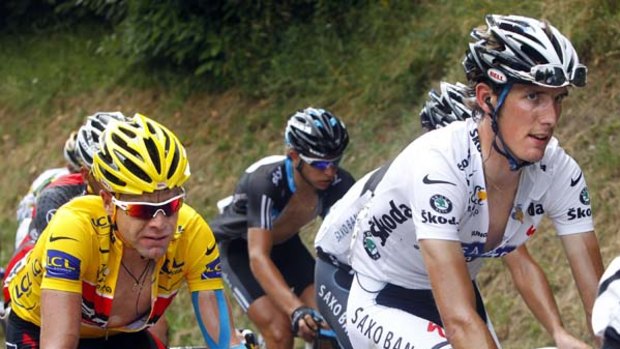 Ready to ride away ... New Tour de France leader Andy Schleck, right, and former leader Cadel Evans during stage nine.