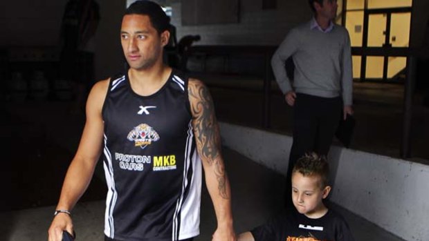 Marshall at Wests Tigers training with Lleyton Giles, 5, who suffers from short gut disease.