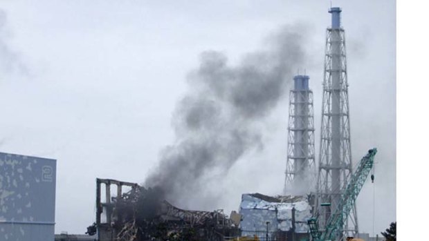 Smoke billows from the area of the No. 3 reactor of the Fukushima Daiichi nuclear power plant on Monday, March 21.