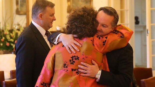 Chris Bowen hugs Therese Rein on Thursday.