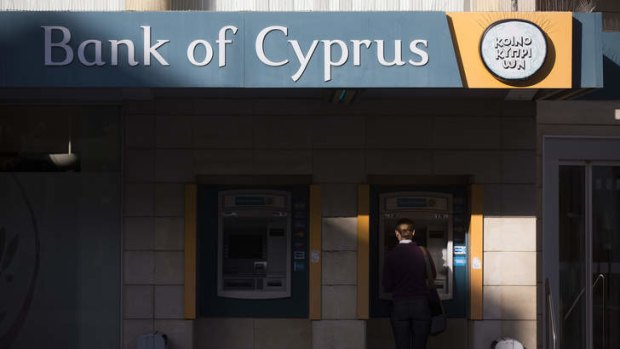 Shadows of a crisis ... banks remain closed in Cyprus until Tuesday.