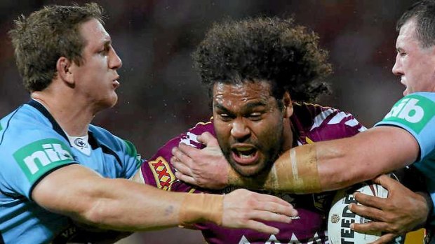Buffer zone: Ryan Hoffman (left) will be out to protect Blues five-eighth James Maloney from the rampaging Sam Thaiday (centre) in Origin III.