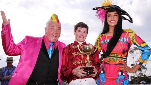 City of Greater Geelong Mayor, Cr Darryn Lyons and his fiancee Elissa Friday congratulate winning jockey Craig Williams at the 2014 Geelong Cup.