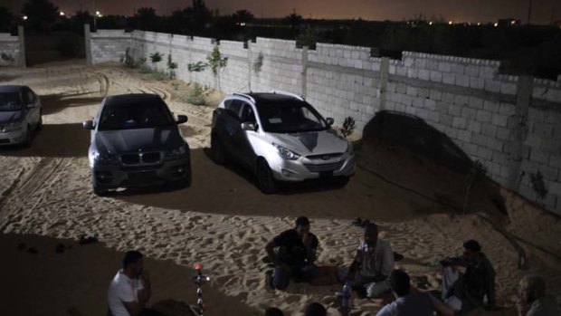 Bonanza &#8230; Bedouin smugglers earn a generous profit from cars bought in Libya which are transported through tunnels to Gaza.