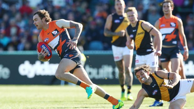 Giant Rory Lobb leaves Tigers in his wake before injuring his ankle. 