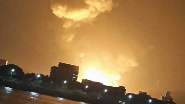 Flames climb into the sky after Indian Navy submarine INS Sindhurakshak caught fire in Mumbai.