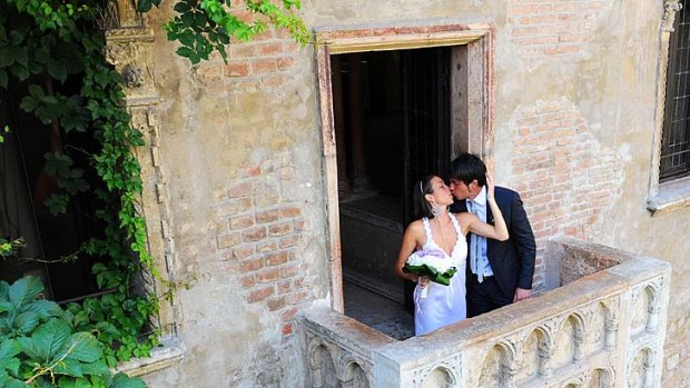 Juliet's House, Verona. The Casa de Giulietta throngs with tourists eager to have their 'Romeo, Romeo' moment on its fabled balcony.