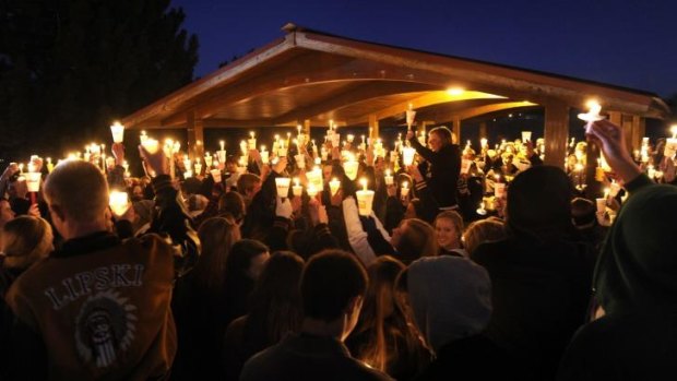 Hundreds of Arapahoe High School students gathered for a candlelight vigil on Saturday,  to share their prayers for Claire Davis who was shot inside the school. 