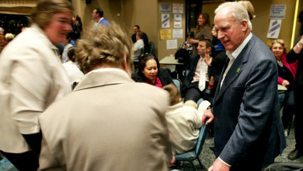 Lionel Bowen (right) talks to  Labor party members at the Randwick Labor Club in 2004.