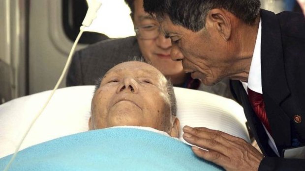 Goodbye: A man from the North farewells his elderly father from the South.