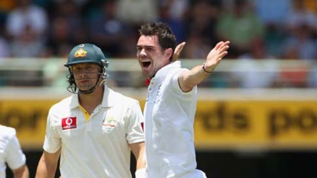 James Anderson of England celebrates taking the wicket of Shane Watson.