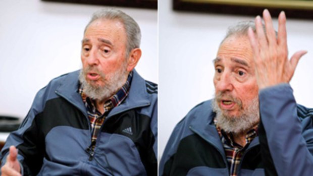 The Comandante returns  ... Fidel Castro gestures during a TV appearance on Monday.