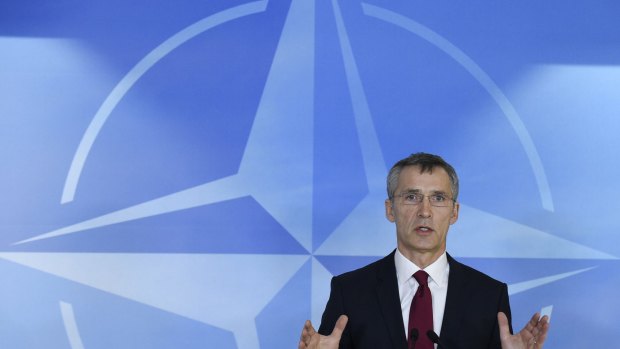 NATO Secretary-General Jens Stoltenberg addresses the media before the meeting of defence ministers in Brussels.